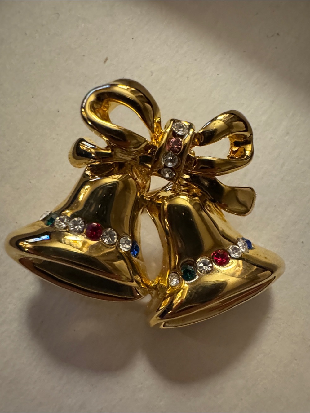 Gold-Tone Holiday Bell Bow Brooch with Multicolor Rhinestones